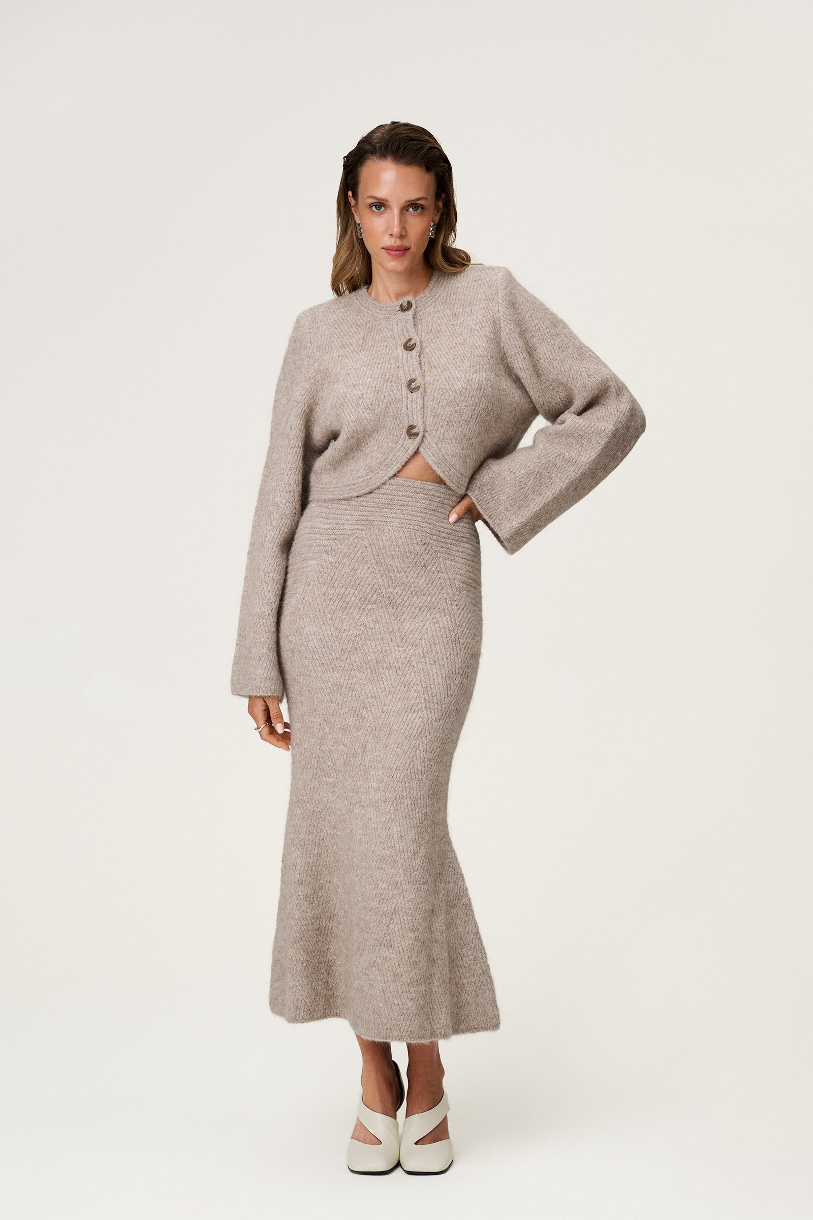 Knitted Cessole midi lengthed skirt in greige. image