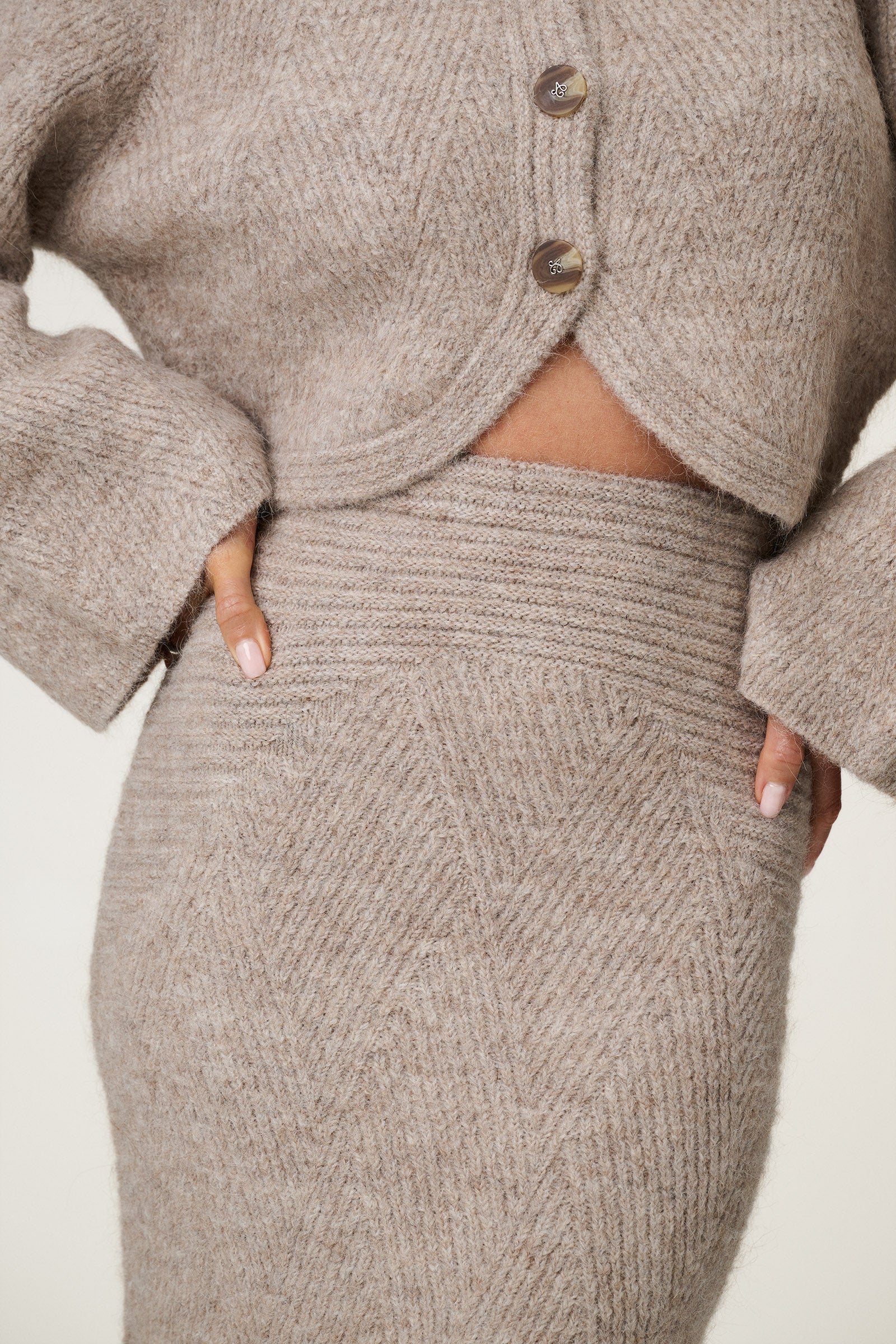 Knitted Cessole midi lengthed skirt in greige. image