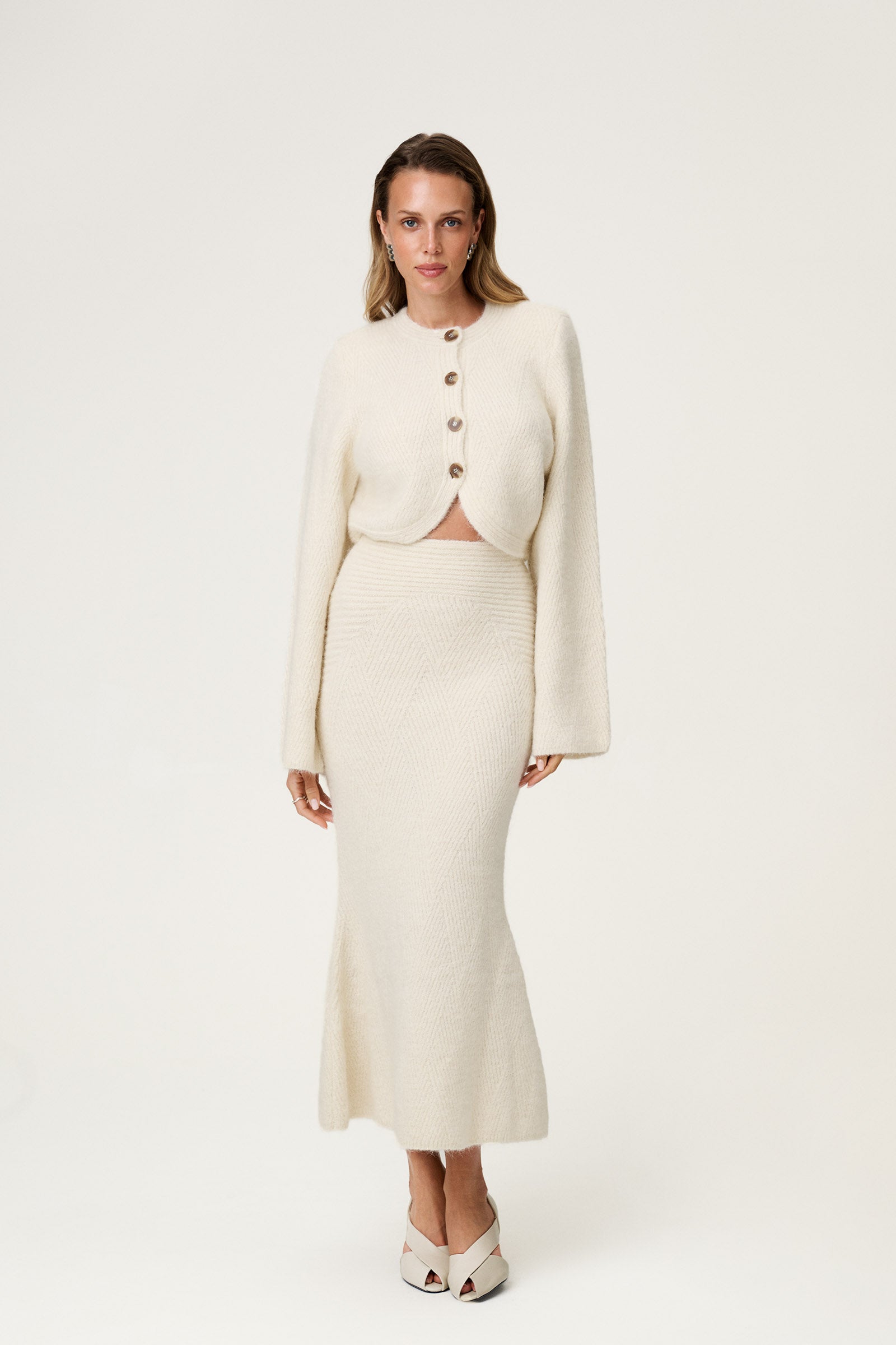 Cessole knitted midi skirt in off white. image