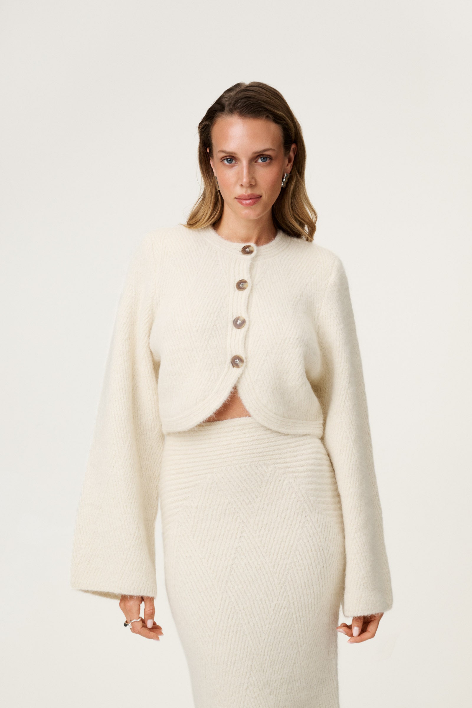 Cessole knitted midi skirt in off white. image
